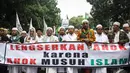 Gerakan Masyarakat Jakarta (GMJ) melakukan aksi longmarch dari Bundaran Hotel Indonesia  menuju kantor DPRD DKI Jakarta di Kebon Sirih, Jakarta, Senin (10/11/2014)   (Liputan6.com/Faizal Fanani)
