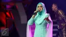 Aksi Siti Nurhaliza di Golden Memories International, Jakarta, Kamis (12/1). Penyanyi 37 tahun itu punya kenangan tersendiri dengan Indosiar. Siti mengaku mengawali kariernya di Tanah Air dengan banyak tampil di Indosiar. (Liputan6.com/Yoppy Renato)