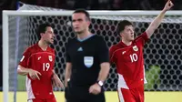 Ekspresi kegembiraan bintang Timnas Indonesia, Ole Romeny (kanan), setelah mencetak gol ke gawang Bahrain pada pertandingan kualifikasi Piala Dunia 2026 di Stadion Utama Gelora Bung Karno, Jakarta, Selasa (25/3/2025). (Bola.com/Bagaskara Lazuardi)
