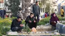 Warga Palestina yang saat ini masih mengungsi di kamp Nuseirat menyambut Hari Raya Idul Fitri 1446 Hijriah dengan suka cita. (Eyad BABA/AFP)