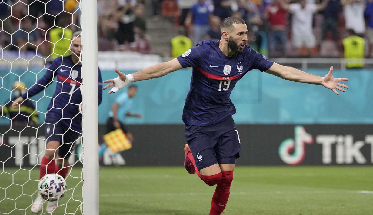 Kurang dari semenit, Prancis sukses membuat gol penyama kedudukan. Benzema, memanfaatkan umpan Mbappe, berhasil mengecoh kiper Yann Sommer yang sepanjang laga tampil cukup apik. (Foto: AP/Pool/Vadim Ghirda)