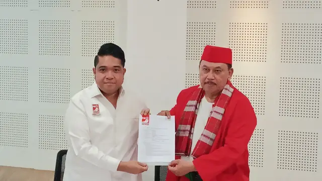 Ketua DPW PSI DKI Jakarta Justin Adrian Untayana dan Achmad Sajili.
