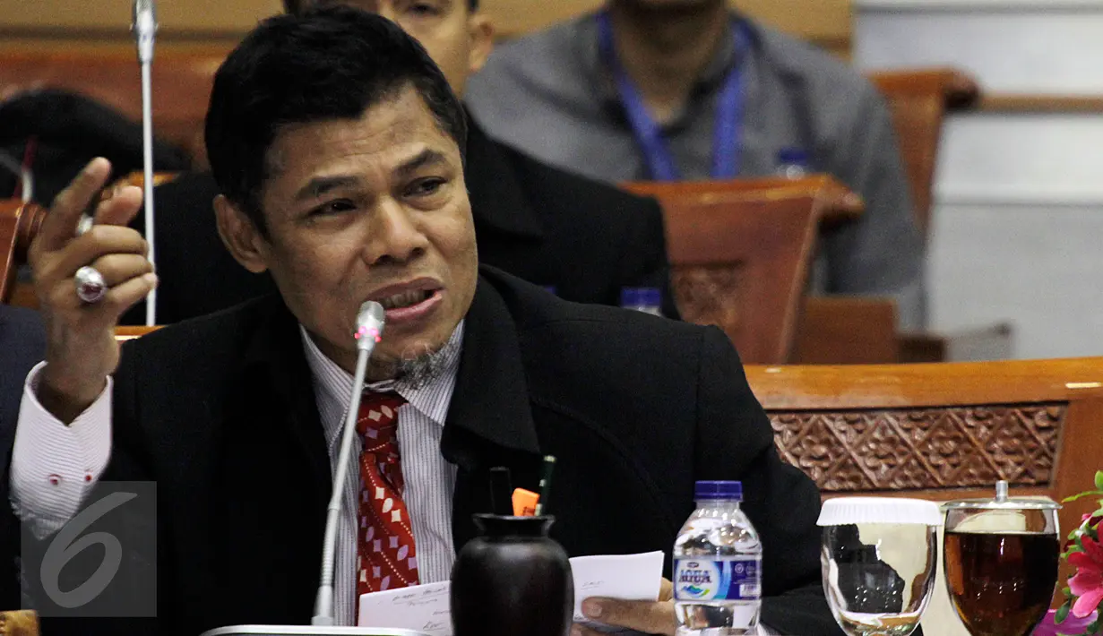 Kepala PPATK Muhammad Yusuf mengikuti Rapat Dengar Pendapat (RDP) dengan Komisi III DPR, Jakarta, Kamis (11/2). RDP tersebut meminta pendapat penjelasan terkait dengan legislasi dan pengawasan. (Liputan6.com/Johan Tallo)