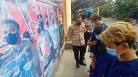 Suami Istri Dan Pekerja Panti Pijak Esek-esek Di Mapolda Banten. (Jumat, 03/12/2021). (Liputan6.com/Yandhi Deslatama).