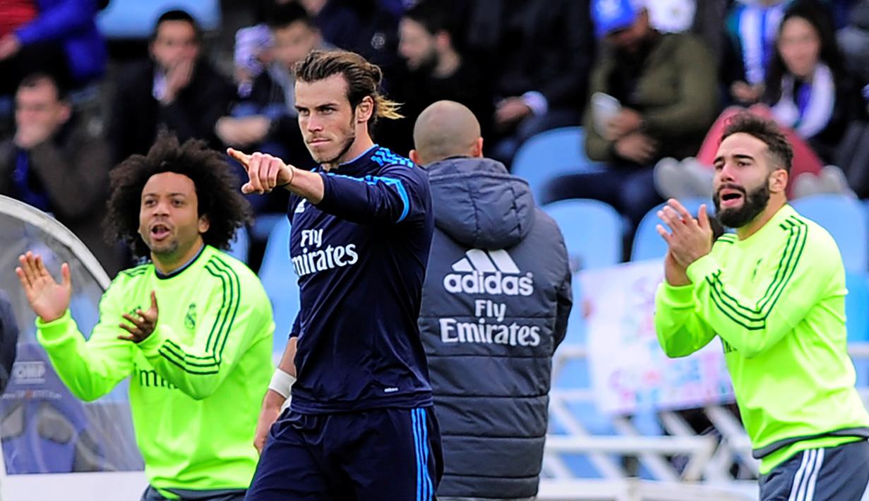 Real Madrid meraih kemenangan 1-0 atas Real Sociedad dalam laga pekan ke-36 La Liga Spanyol di Stadion Anoeta, Sabtu (30/4/2016) malam WIB. Gol tunggal Los Blancos dicetak Gareth Bale pada menit ke-80. (AFP/Ander Gillenea)
