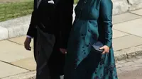 Zara Tindall dan Mike Tindall, orangtua Lena Tindall saat menghadiri pernikahan Pangeran Harry dan Meghan Markle. (ANDREW MILLIGAN / POOL / AFP/Asnida Riani)