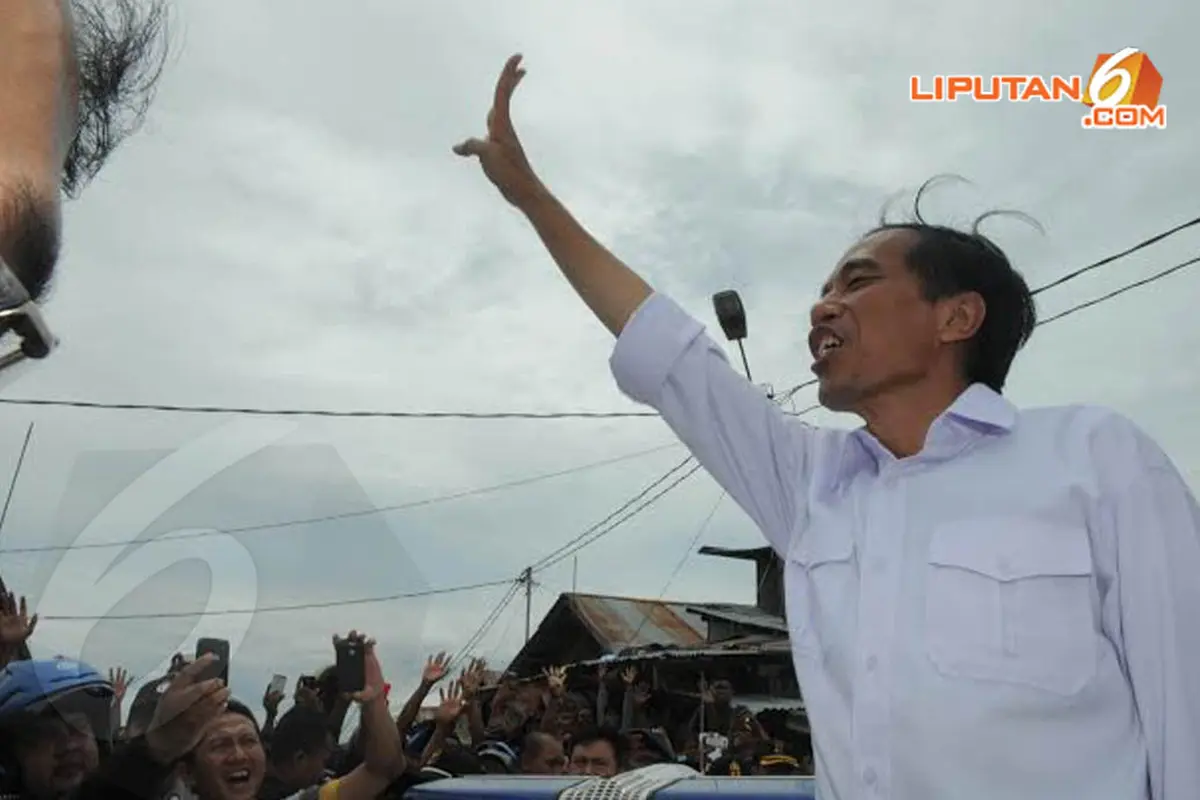 [FOTO] Ekspresi Jokowi dan Warga Papua di Pasar Yotefa