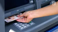 Ilustrasi Foto Mesin  ATM (Anjungan Tunai Mandiri) (iStockphoto)