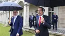 <p>Ini merupakan hari kedua kunjungan kerja Jokowi ke Australia. (Lisa Maree Williams/Pool Photo via AP)</p>