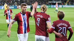 Dengan kemenangan besar itu, Norwegia untuk sementara memuncaki klasemen Grup I dengan perolehan 3 poin. Sedangkan Moldova berada di dasar klasemen grup. (AP Photo/Aurel Obreja)