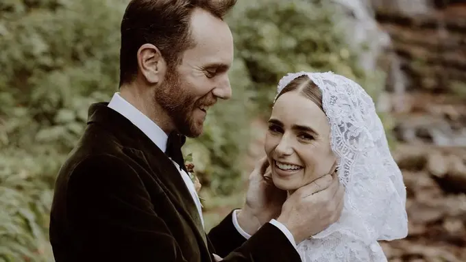 Lily Collins kenakan gaun didominasi warna putih berenda di hari Pernikahannya/dok. Instagram @Lilyjcollins