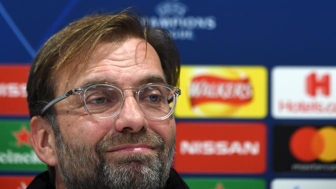 Jurgen Klopp menegaskan Liverpool akan bermain menyerang pada laga lanjutan Liga Champions melawan Napoli yang berlangsung di stadion Anfiled, Inggris, Rabu (13/12). Liverpool membutuhkan kemenangan agar bisa lolos ke babak gugur. (AFP/Paul Ellis)