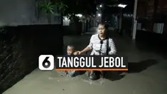 tanggul jebol