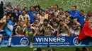 Zenit St Petersburg team celebrate with the trophy after they won the UEFA Cup final match between Scottish football club Glasgow Rangers and Russian side Zenit St Petersburg/ PAUL ELLIS