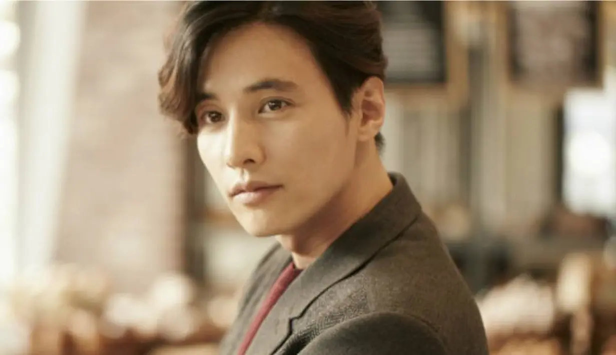 Setelah lama tak muncul, akhirnya Won Bin muncul sebagai bintang iklan. Tentu saja kemunculan ini membuat banyak pihak jadi heboh. (Foto: Allkpop.com)