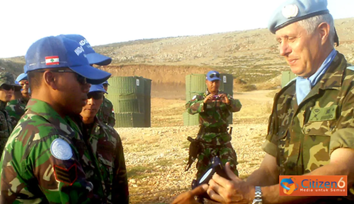 Citizen6, Lebanon Selatan: Prajurit TNI yang tergabung dalam Satgas Batalyon Mekanis Kontingen Garuda XXIII-F/UNIFIL (Indobatt) di Lebanon menempati urutan kedua pada pertandingan menembak tingkat UNIFIL, Minggu (27/5). (Pengirim: Badarudin Bakri)
