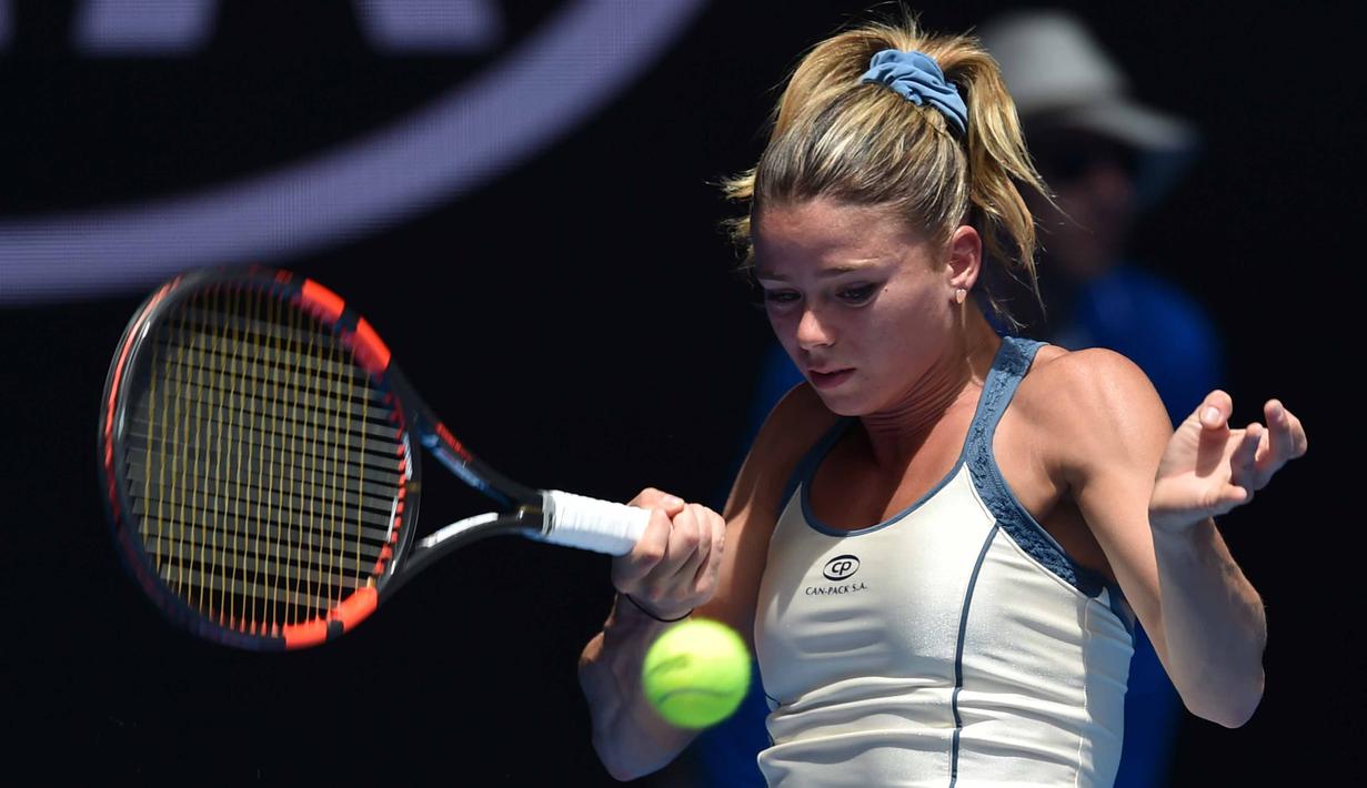 Camila Giorgi juga beberapa kali memperkuat Tim Piala Fed Italia. (AFP/Saeed Khan)