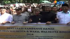 Pawai kampanye damai ini juga digelar untuk memperkenalkan diri 4 pasangan calon kepada masyarakat.