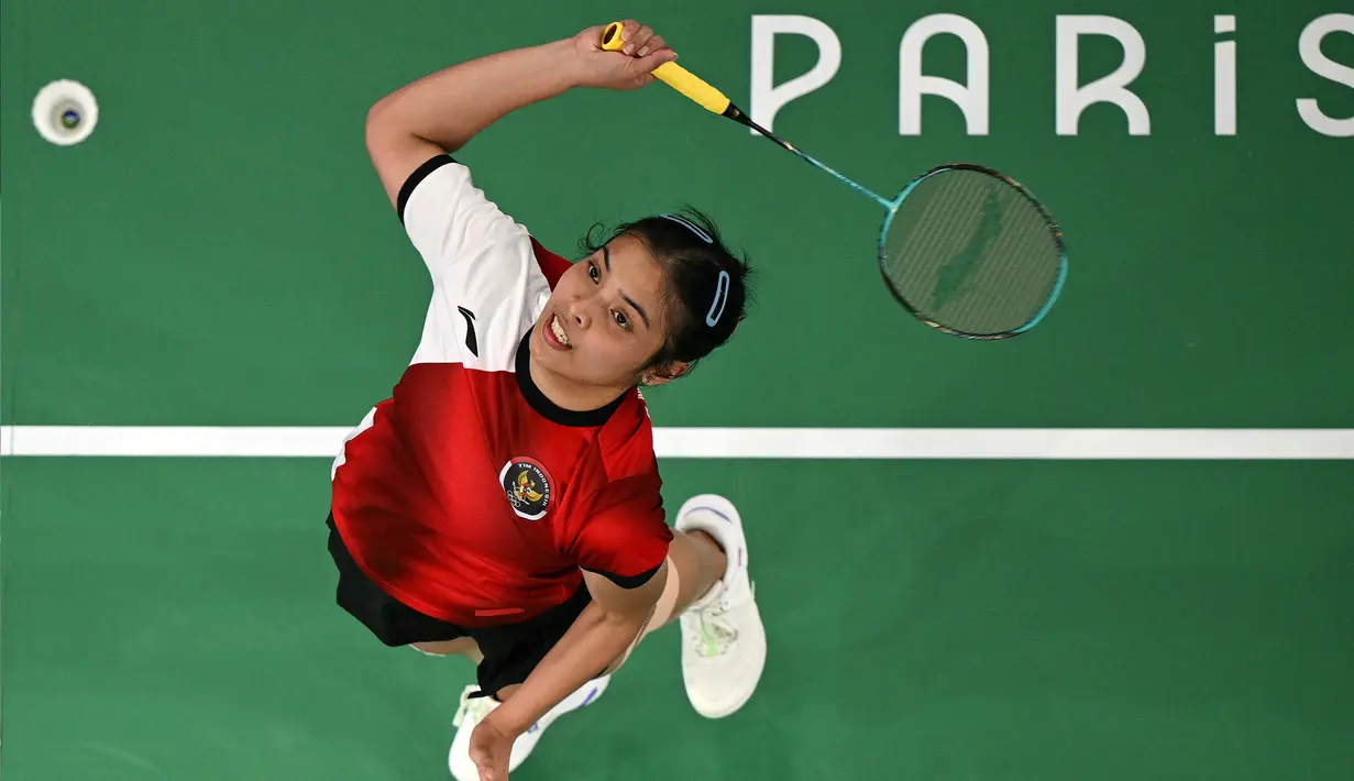 Gregoria Mariska Tunjung memenangi set pertama dengan skor 21-11. (Antonin THUILLIER/AFP)