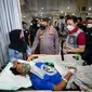 Kapolri Jendral Listyo Sigit Prabowo menjenguk korban luka yang dirawat di RSUD Kanjuruhan, Malang, Jawa Timur pada Minggu malam, 2 Oktober 2022. (Foto: Liputan6/Ady&nbsp;Anugrahadi)
