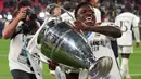 Di menit ke-83, Vinicius Junior menggandakan keunggulan Real Madrid atas Borussia Dortmund. (AP Photo/Ian Walton)