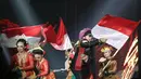 Atta Halilintar Kibarkan Bendera Merah Putih di Panggung YouTube FanFest Indonesia 2019. (Bambang E Ros/Fimela.com)