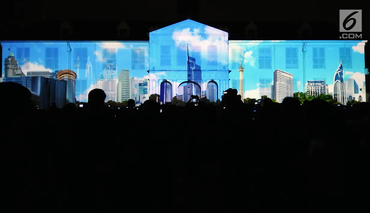Salah satu pertunjukan projection mapping yang menggambarkan kondisi kota Jakarta di Museum Fatahillah, Jumat (19/1). Pertunjukan ini menandai rangkaian kegiatan perayaan 60 tahun hubungan diplomatik Indonesia-Jepang. (Liputan6.com/Helmi Fithriansyah)