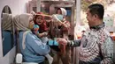 Program ini bertujuan untuk meningkatkan kualitas kesehatan masyarakat Indonesia dan mengurangi beban penyakit yang bisa dicegah. (YASUYOSHI CHIBA/AFP)