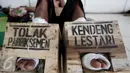 Petani dari kawasan Pegunungan Kendeng, Kabupaten Rembang, Jawa Tengah, melakukan aksi protes memasuki hari ke keenam mencor kaki dengan semen di kantor LBH Jakarta, Jakarta Pusat, Sabtu (18/3). (Liputan6.com/Johan Tallo)
