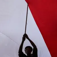 Bendera Indonesia dan lagu Indonesia raya berkumandang di penutupan Asian Games 2014 yang berlangsung di Incheon, Korea Selatan. (Liputan6.com)