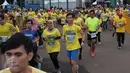 Peserta antusias mengikuti home run in harmony di Senayan, Jakarta, Minggu (21/2). Di usia yang semakin matang, BTN semakin memantapkan posisinya sebagai bank berplat merah yang cukup ekspansif di sektor pembiayaan perumahan. (Liputan6.com/Angga Yuniar)