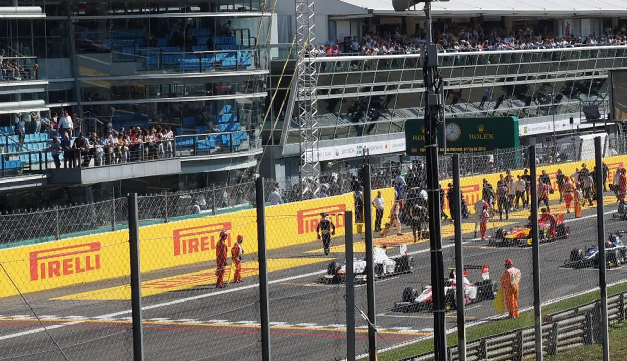 Beberapa pembalap siap beraksi di ajang Grand Prix Italia 2014 di Sirkuit Monza, Italia, (7/9/2014). (Liputan6.com/Nurseffi Dwi Wahyuni)