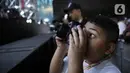 Bahkan Kellen Lemos juga sempat mengabadikan penampilan KD lewat kamera foto. (Kapanlagi.com/Bambang Ekoros Purnama)