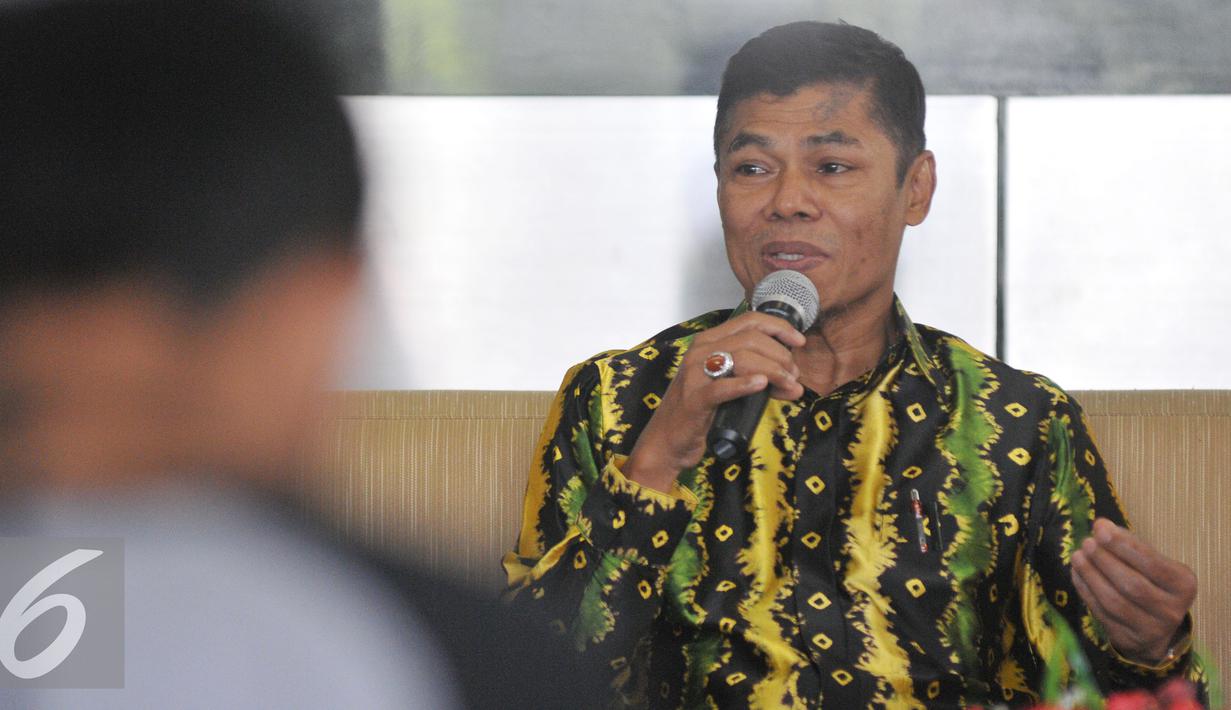 Ketua PPATK M Yusuf memberi keterangan kepada wartawan terkait penghapusan Indonesia dari status Grey Area oleh Financial Action Task Force on Money Loundering (FATF) di Kantor PPATK Jakarta, Jumat (26/6/2015). (Liputan6.com/Herman Zakharia)