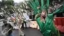 Aksi perempuan menuntut keadilan iklim di depan Istana Negara, Jakarta, Selasa (17/5). Dalam aksinya mereka meminta pemerintah Indonesia tegas dan konsisten dalam langkah mengatasi perubahan iklim. (Liputan6.com/Faizal Fanani)