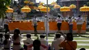 Hari Raya Galungan menjadi perayaan kemenangan Dharma melawan Adharma. (SONNY TUMBELAKA/AFP)