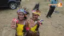 Beberapa remaja putri pun mengikuti kampanye Jokowi yang digelar di lapangan Papua Trade Centre (Liputan6.com/Herman Zakharia)  