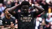 Arsenal kembali membuang kesempatan mempertahankan jarak dengan Manchester City dalam upaya merebut gelar juara Liga Inggris 2022/2023. Terbaru, The Gunners gagal memetik tiga poin penuh di kandang West Ham United, Minggu (16/4/2023) setelah dipaksa bermain imbang 2-2 meski sempat memimpin dua gol terlebih dahulu. Arsenal yang kini hanya unggul 4 poin dan telah memainkan satu laga lebih banyak pun harus bersiap ditikung Manchester City di laga-laga ke depan. (AFP/Ben Stansall)