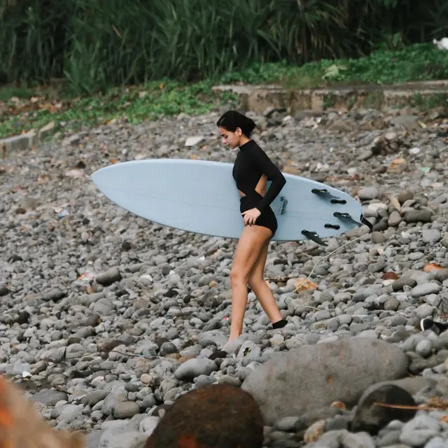 Tak Hanya Lari Tapi Juga Gemar Berselancar