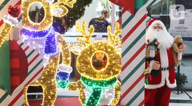 Seorang anak berfoto di dekat pernak pernik Natal di Living World, Tangerang Selatan, Senin (13/12/2021). Jelang perayan Natal sejumlah pusat perbelanjaan dihiasi ornamen Natal yang dijual. (Liputan6.com/Anga Yuniar)