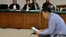 Teddy Renyut juga merekomendasikan supaya Kementerian PDT dibubarkan saja, Pengadilan Tipikor, Jakarta, Senin (13/10/2014) (Liputan6.com/Miftahul Hayat) 