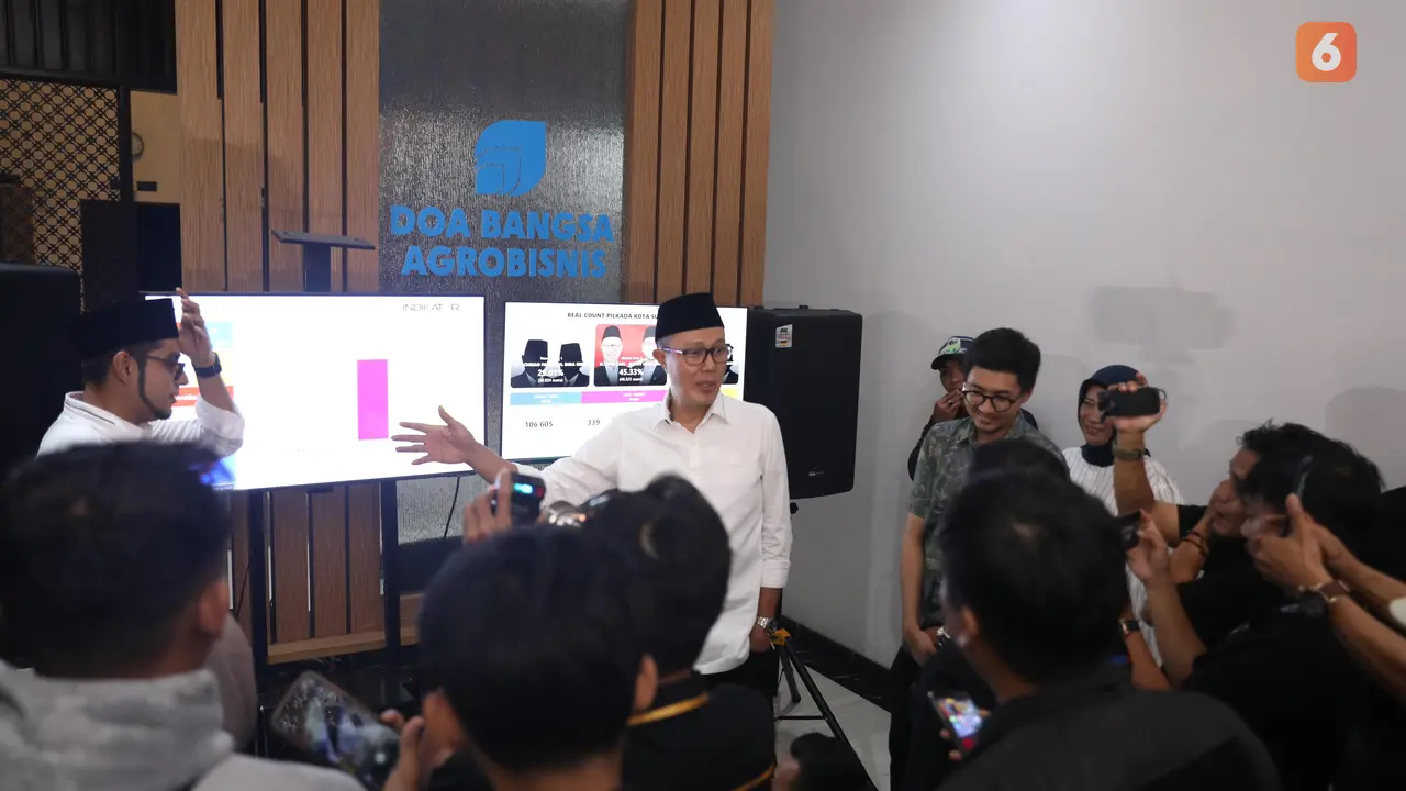 Paslon walikota dan wakil walikota Sukabumi Ayep Zaki dan Bobby Maulana saat menyampaikan hasil quick count (Liputan6.com/ Fira Syahrin).