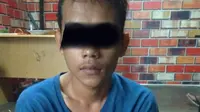 Seorang pemuda di Gorontalo berhasil ditangkap polisi lantaran menyebar kabar bohong alias hoaks yang meresahkan warga. (Liputan6.com/ Arfandi Ibrahim)
