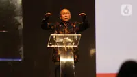Menkop UKM Teten Masduki memberi paparan dalam Indonesia Digital Conference (IDC) 2019 di Jakarta, Kamis (28/11/2019). IDC digagas para pengurus AMSI sebagai wadah bertukar pengalaman, gagasan, dan strategi membangun ekosistem digital untuk masa depan. (Liputan6.com/Angga Yuniar)
