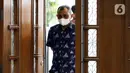Maskur Husain sesaat sebelum menjadi saksi dalam sidang lanjutan dugaan suap penanganan perkara korupsi di Lampung Tengah dengan terdakwa Azis Syamsuddin di Pengadilan Tipikor Jakarta, Kamis (23/12/2021). (Liputan6.com/Helmi Fithriansyah)
