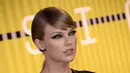  Taylor Swift baru saja membuat pernyataan besar di panggung Staples Center, Los Angeles. (Bintang/EPA)