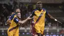 Penyerang AS Roma, Tammy Abraham berselebrasi usai mencetak gol ke gawang Torino pada pertandingan lanjutan Liga Serie A Italia di Stadion Olimpiade di Turin, Italia, Sabtu (21/5/2022). Tammy Abraham mencetak dua gol dan mengantar Roma menang telak atas Torino 3-0. (Spada/LaPresse via AP)