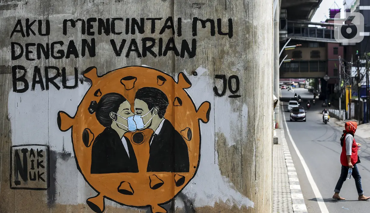Mural imbauan untuk mematuhi protokol kesehatan terlihat pada dinding di Jakarta, Selasa (20/7/2021). Kementerian Kesehatan mencatat pasien COVID-19 di Jakarta yang sembuh pada 19 Juli 2021 sebanyak 12.674 atau meningkat dibandingkan 18 Juli 2021 sebanyak 11.857 orang. (Liputan6.com/Johan Tallo)