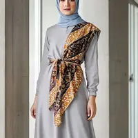 Ilustrasi Model Gamis dengan Obi Belt Batik (Sumber Gambar: Meta AI)