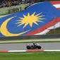 Jorge Lorenzo merayakan gelar juara dunia MotoGP 2010 di Sirkuit Sepang, Malaysia, (10/10/2010). (AFP Photo/Roslan Rahman)